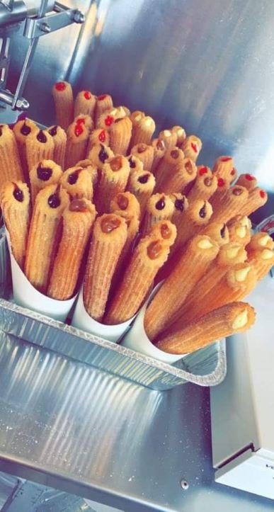 Freshly prepared stuffed churros ready to serve