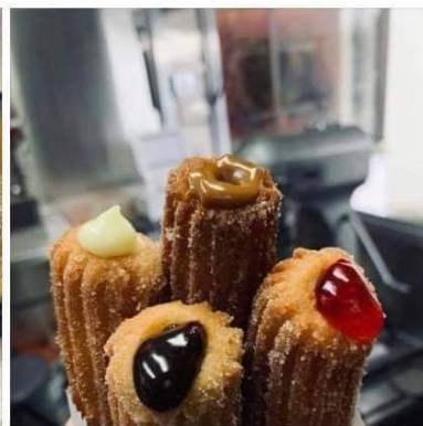 Assorted filled churros with caramel vanilla and strawberry